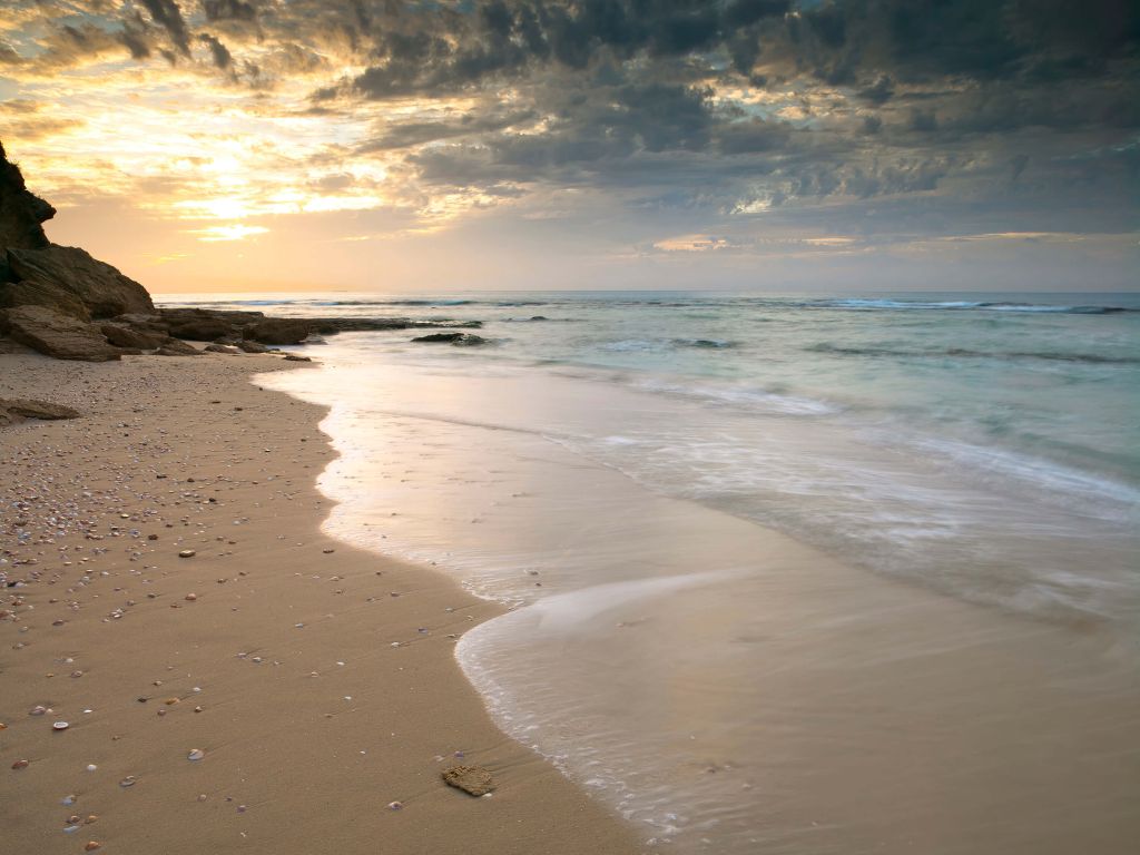 Zonsondergang op het strand